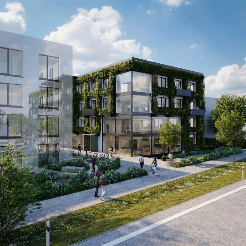 Modernes, vierstÃ¶ckiges BÃ¼rogebÃ¤ude mit begrÃ¼nter Fassade, Balkonen und Blick durch die Fenster auf die einzelnen BÃ¼ros.